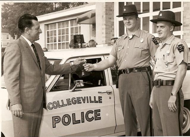 Pictured from left to right Mayor Will DeWane Police Chief Jack McKernan and Officer Jack Clawson (who was later Police Chief.  Picture taken in front of Collegeville Fire Station