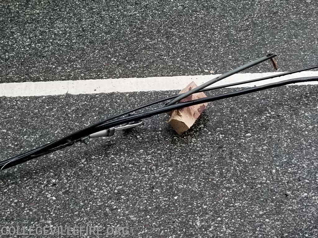 Over size load, pulls down wires and damages building in the 300 block of E. Main Street, Collegeville Borough.