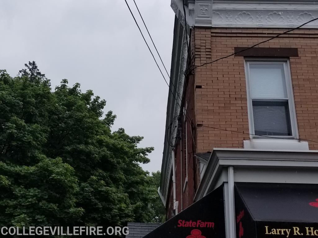 Over size load, pulls down wires and damages building in the 300 block of E. Main Street, Collegeville Borough.