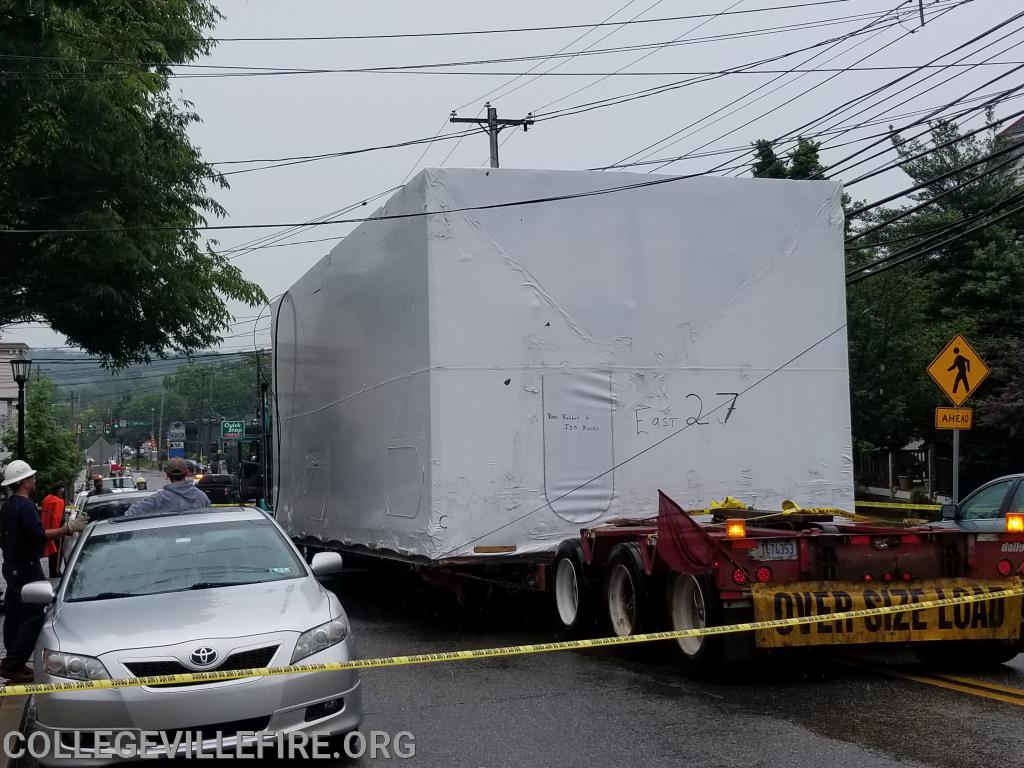 Over size load, pulls down wires and damages building in the 300 block of E. Main Street, Collegeville Borough.