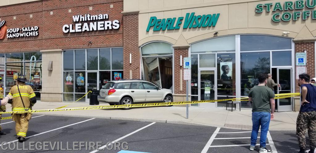 MVA with Rescue vehicle into the building, Providence Town Center, Upper Providence Twp.