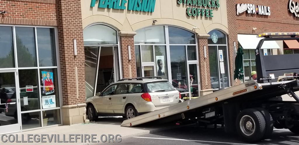 MVA with Rescue vehicle into the building, Providence Town Center, Upper Providence Twp.