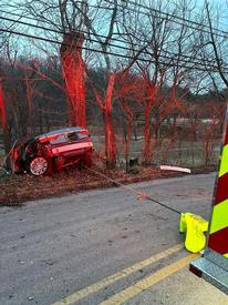 Vehicle secured to Rescue 53 via chain.